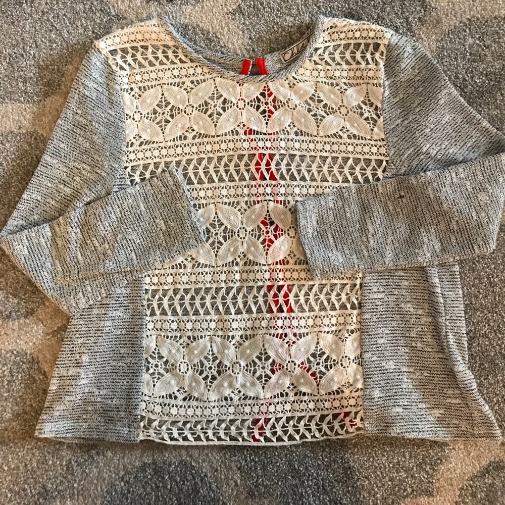 Eyelet sweater with button down back