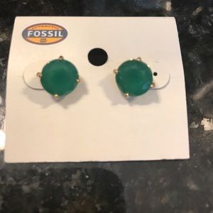 Fossil emerald color studs.