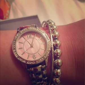 Watch that needs battery n silver beaded bracelet