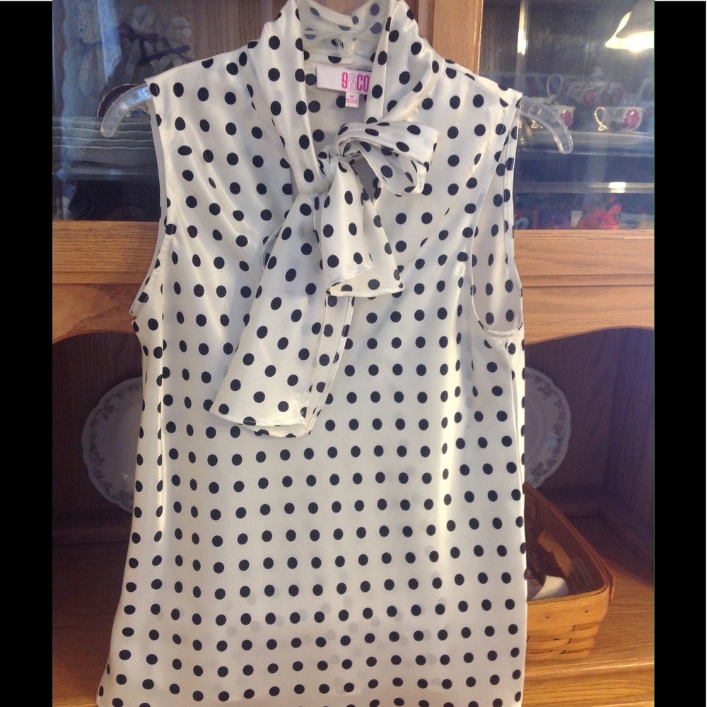 Cream and black polka dot sleeveless top with bow