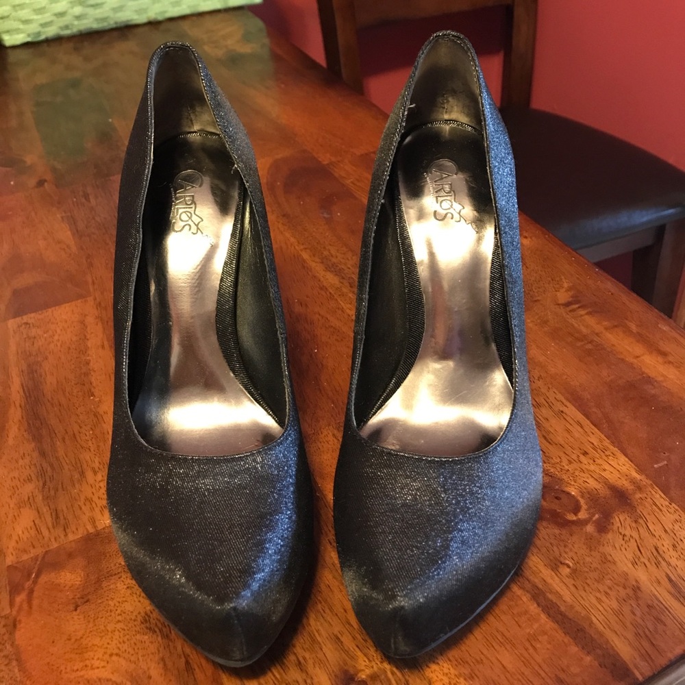 Carlos black glittered heels.