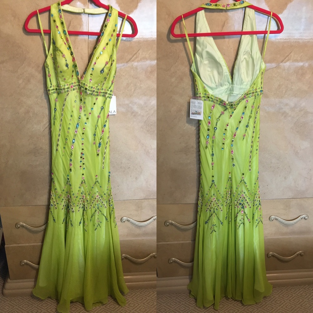 Brand new, never worn, SCALA beaded prom gown.