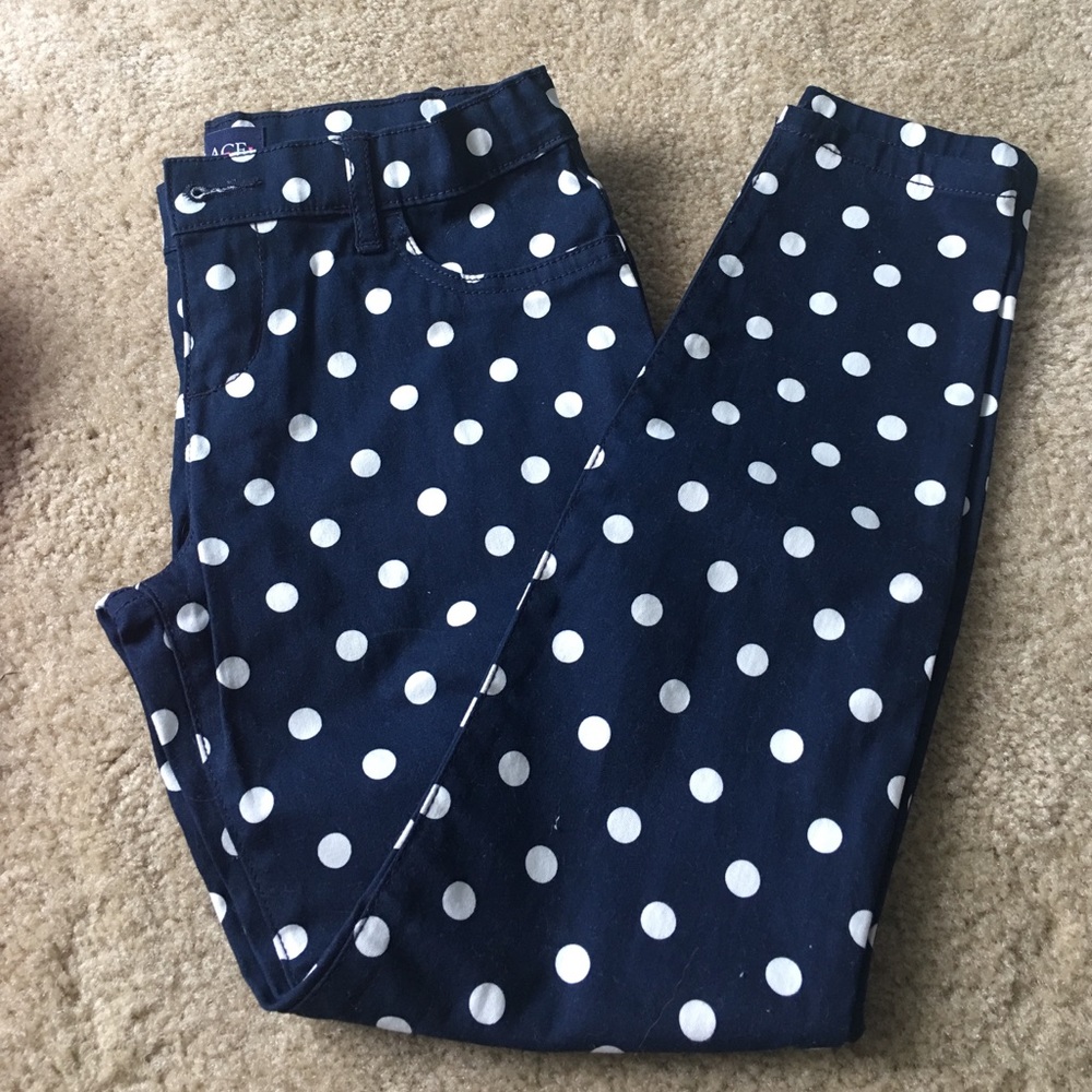 GIRLS Navy with white polka dot pants.