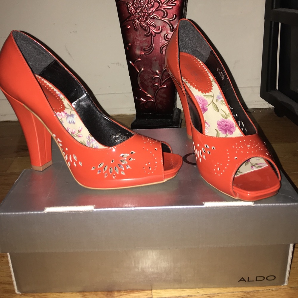 Orange patent peep toe pump