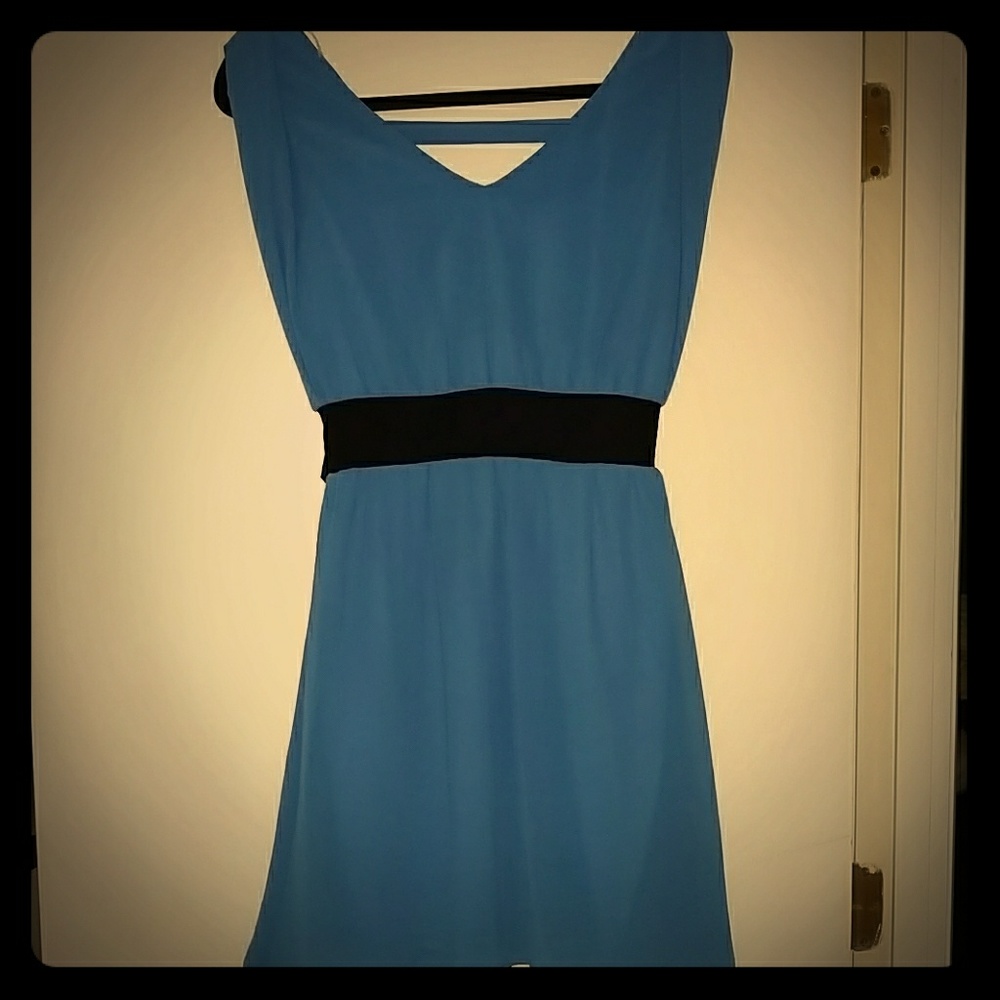 Blue tissue paper dress with black sash