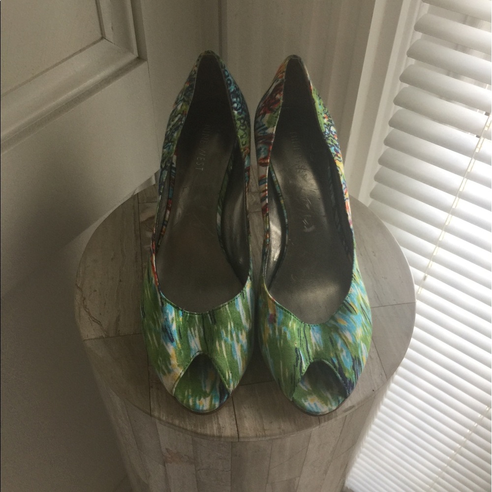Nine West peep toe pumps.