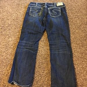 Silver jeans hemmed to capris