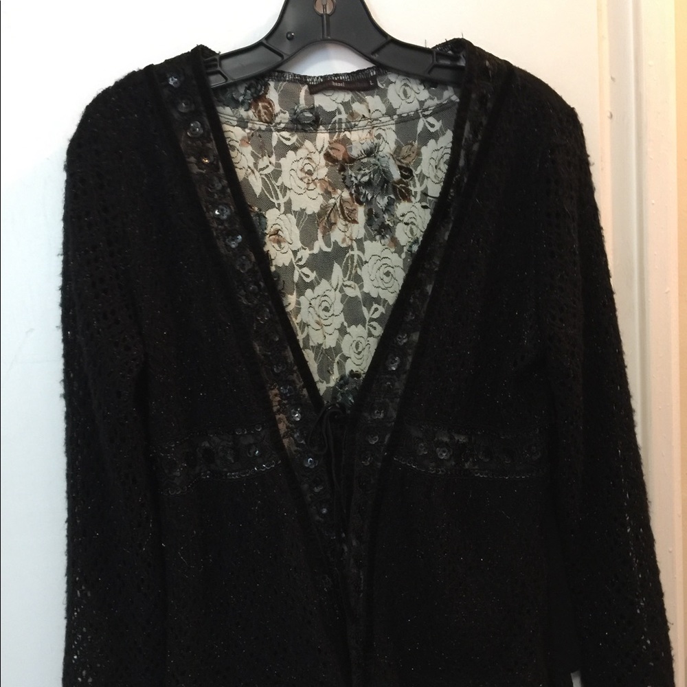 Crochet black sweater.