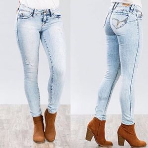 Acid wash ripped skinny jeans