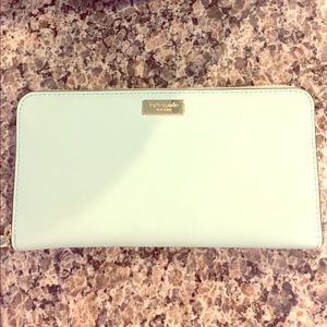 Kate Spade blue zipper wallet.