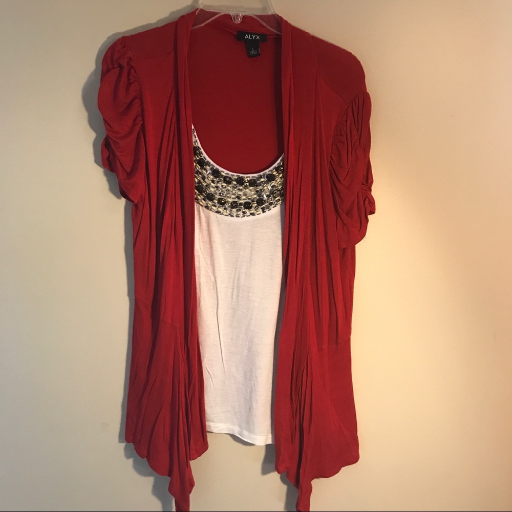 Cream blouse with red cardigan