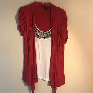 Cream blouse with red cardigan