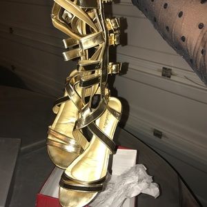 Gold knee Sandals