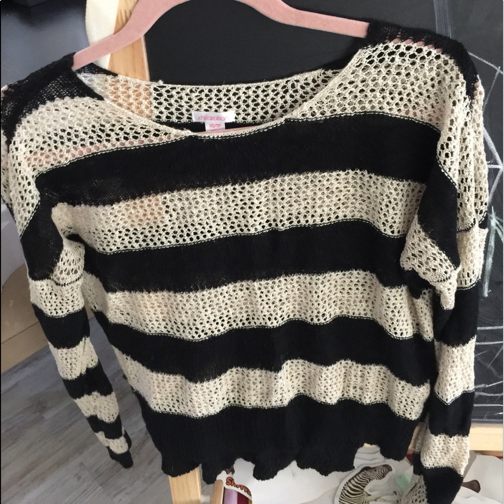 Black and white striped sweater.