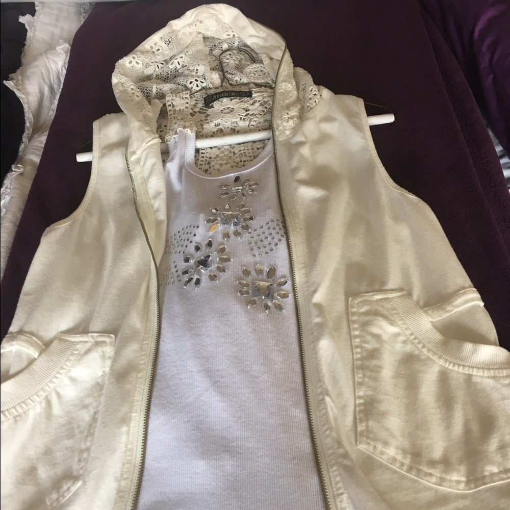 Cream cotton sleeveless vest and white tank top.
