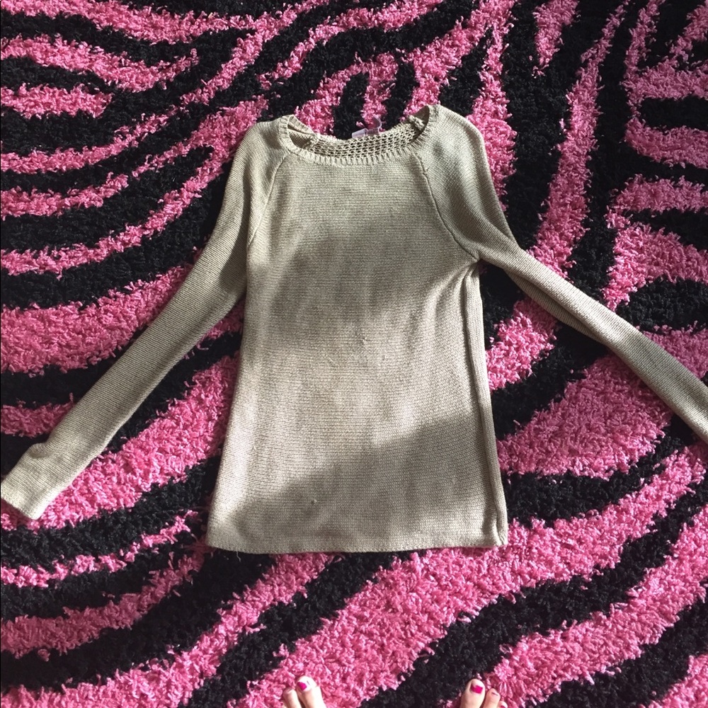 This is a tan sweatshirt