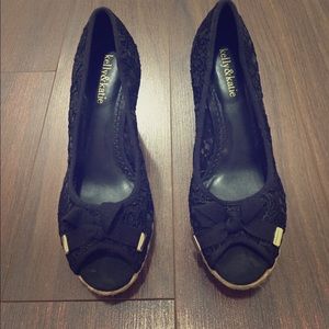 Black wedges with gold detail and black bow