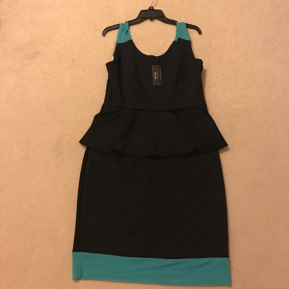 Brand new peplum dress.