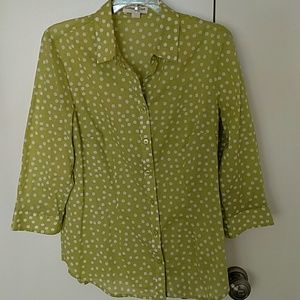 Green polka dot summer shirt.