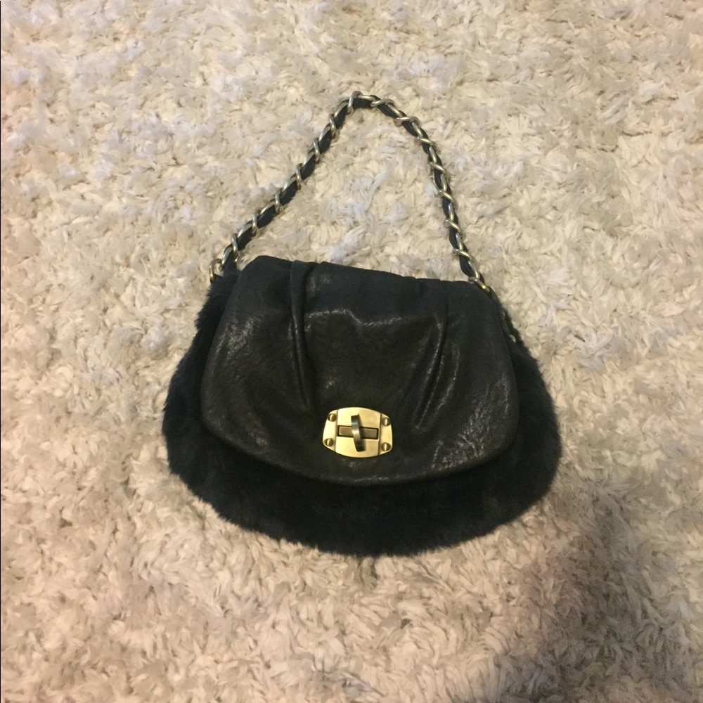 Faux fur satchel with gold hardware