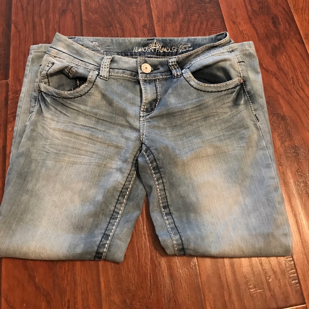 Slightly discolored Capri jeans
