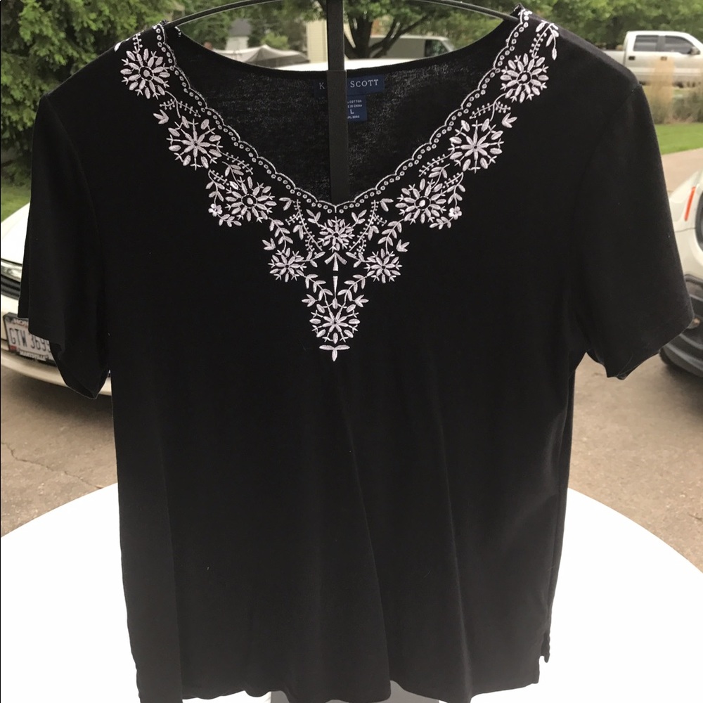 Black flowery shirt