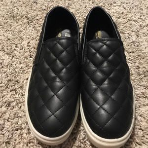 Black slip ons