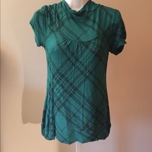 Blue/green and black patterned top.