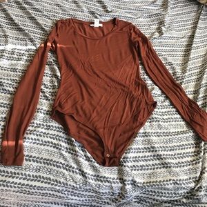 Long sleeve body suit.