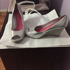 Womens silver wedge shoes.