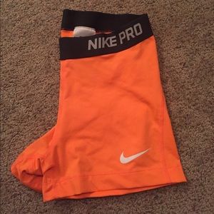 Orange Nike Pro Spandex Shorts