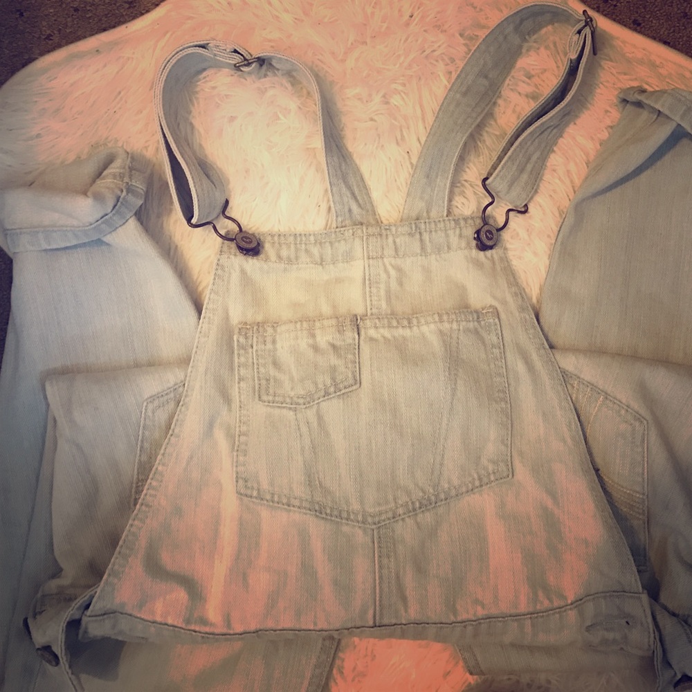 Hollister light wash overalls.