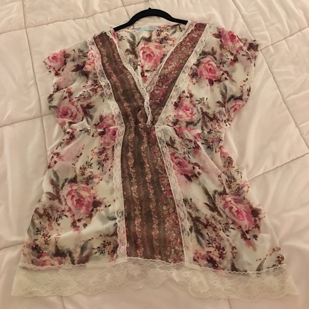 Sheer floral blouse with lace trim