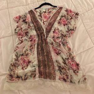 Sheer floral blouse with lace trim