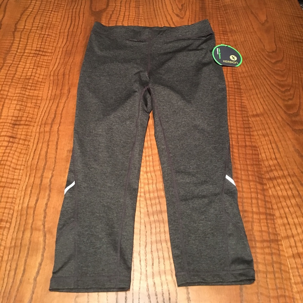 Brand new Xersion running capri