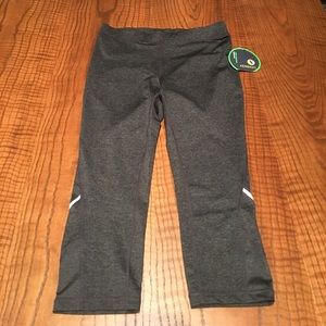 Brand new Xersion running capri