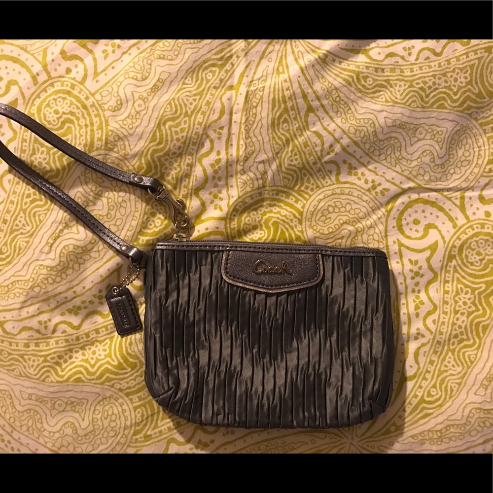 Mid-sized Silver Coach Wristlet