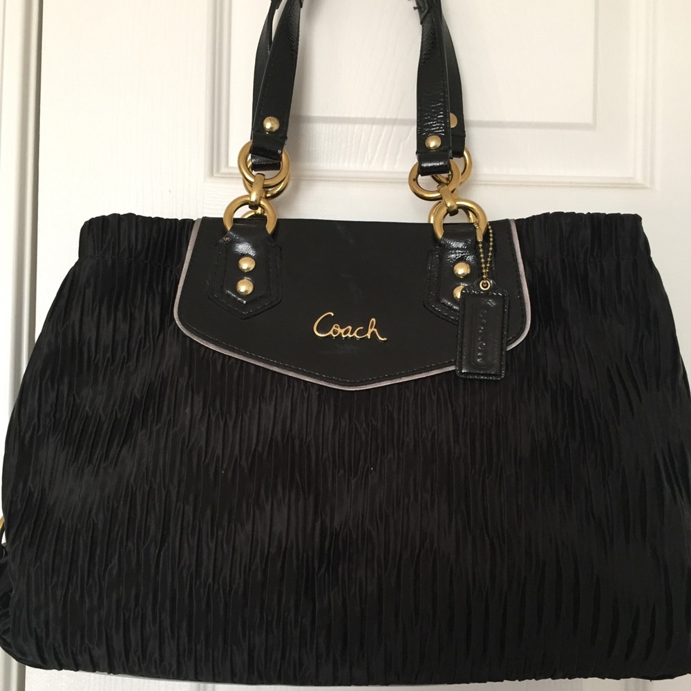 Black w/ gold hardware Authentic Coach purse.