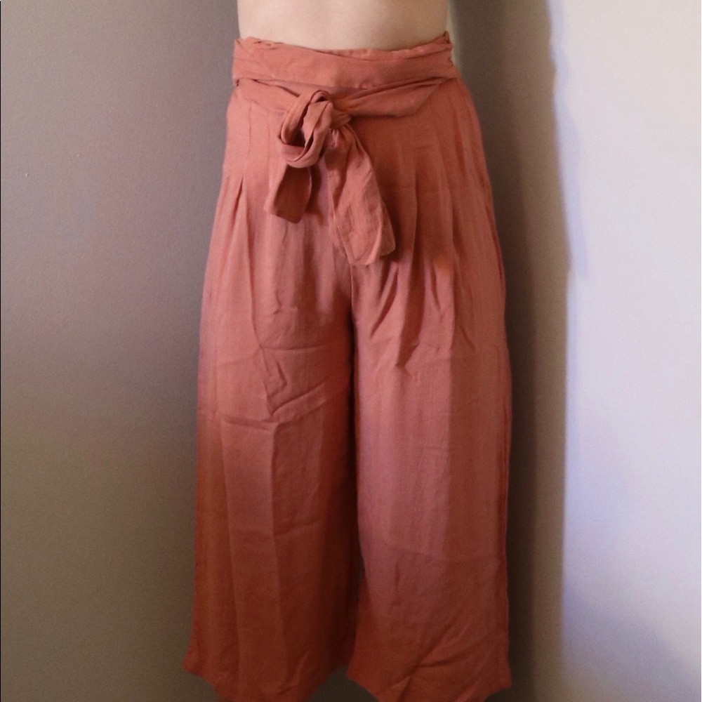Free people flowing salmon colored pants.