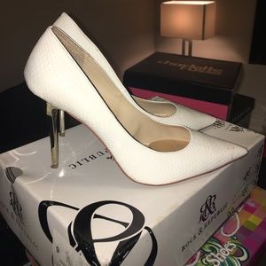 White heels w/ gold heel.