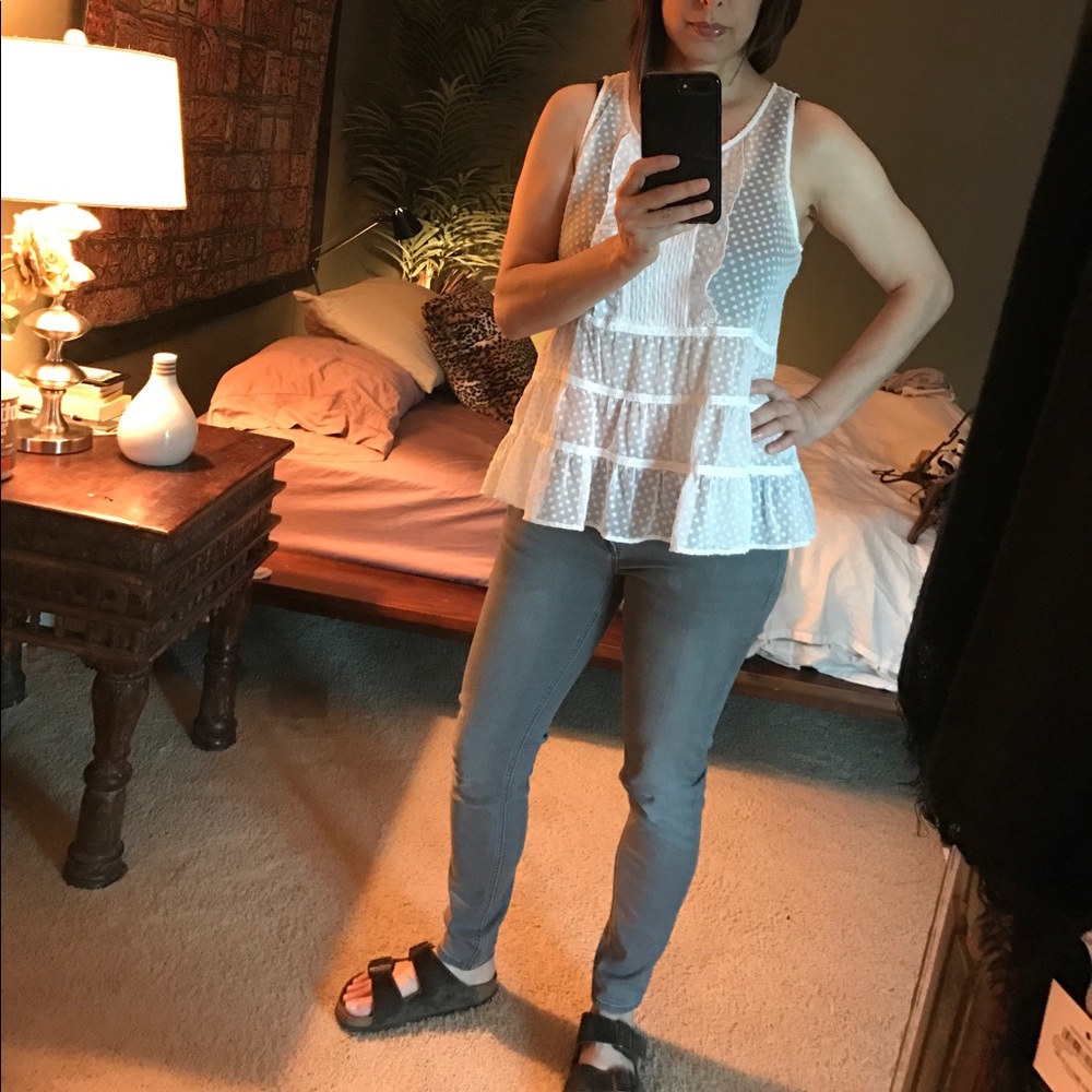 White sheer ruffly baby doll blouse.