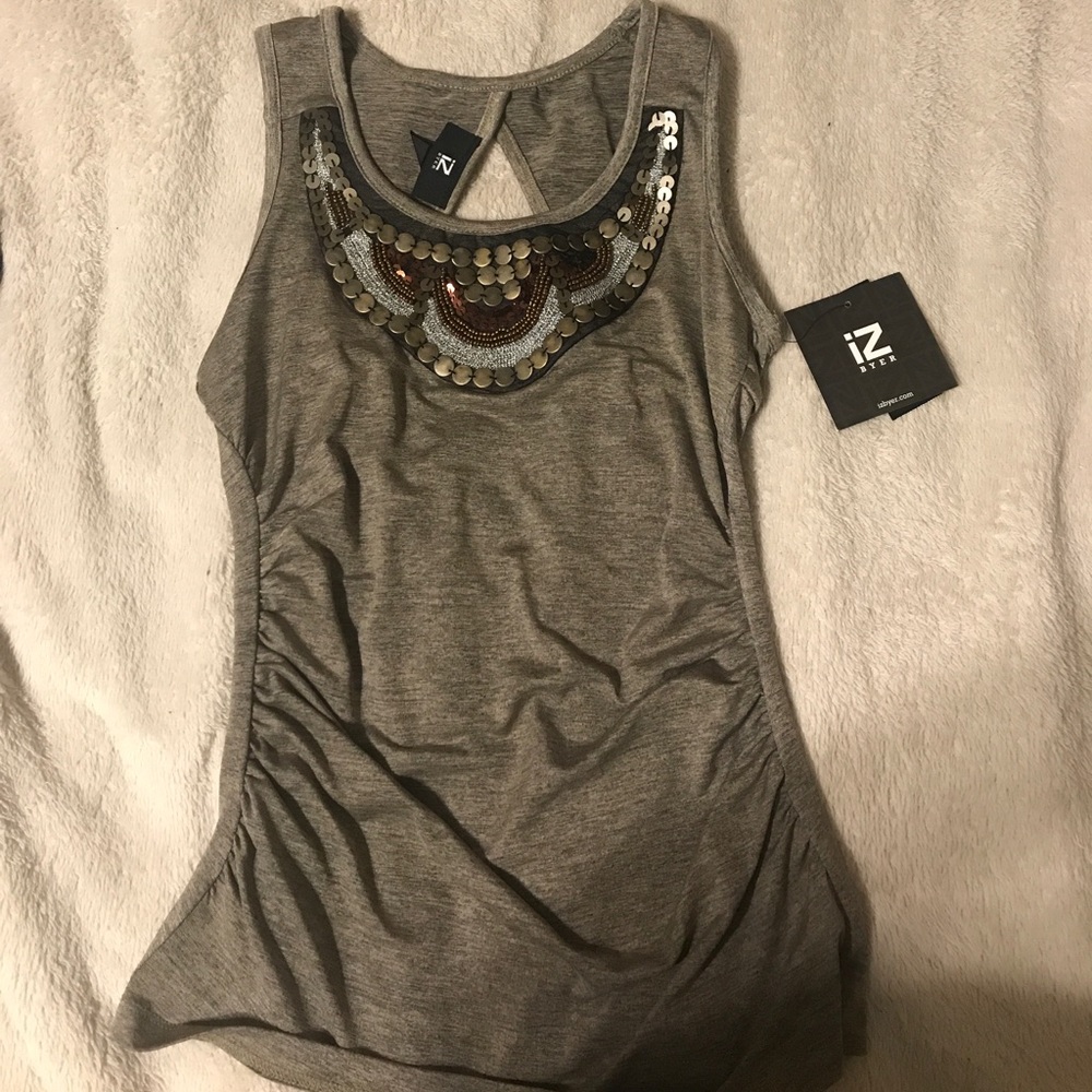 Tank top with cinched sides and decorated chest