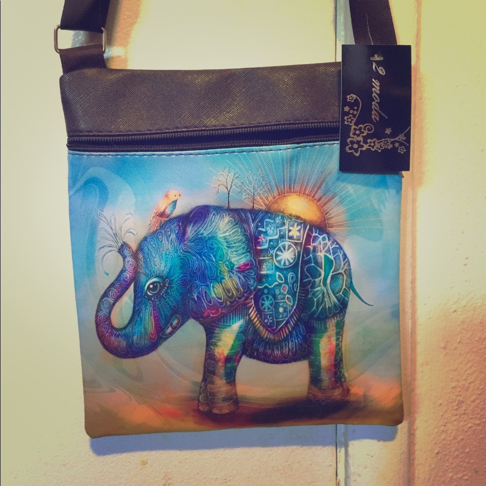 Elephant bag with adjustable strap.