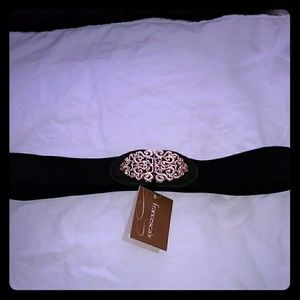 Stretchy black belt with gold hook closure