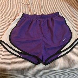 Purple Nike shorts