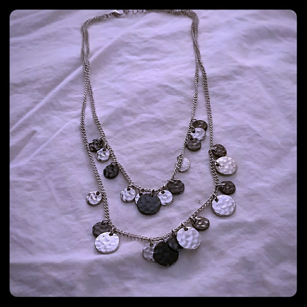 Two strand metal necklace with disk charm