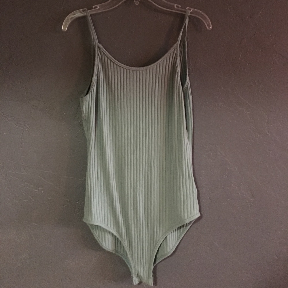 Super cute green body suit from urban
