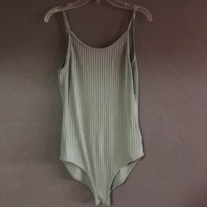 Super cute green body suit from urban