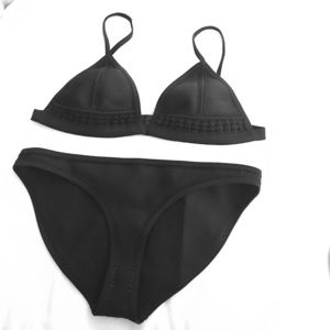 Navy blue embroidered Triangl bikini.