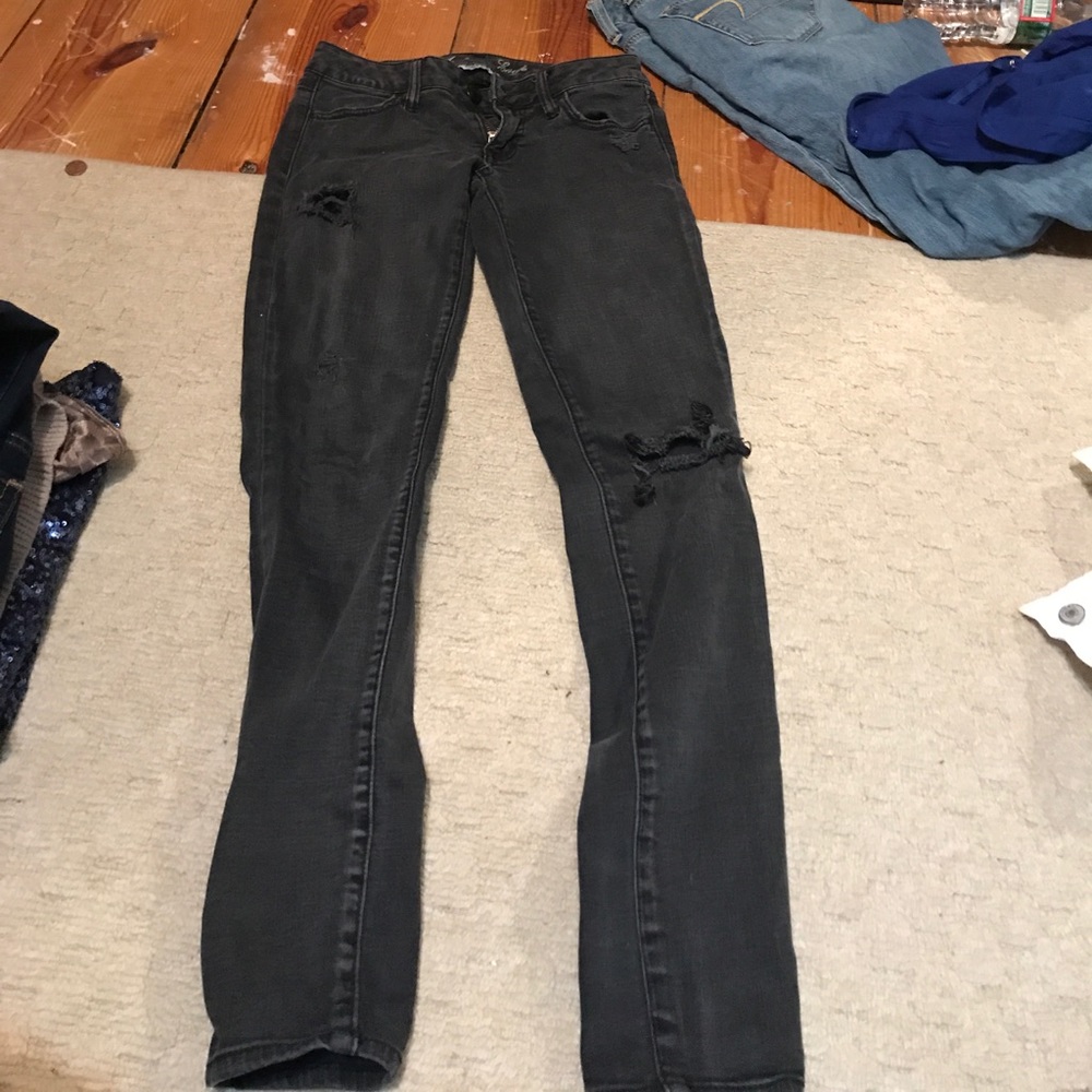 Dark wash, destroyed jeans